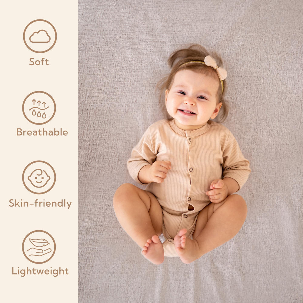 SOULFUL muslin crib sheets fit snugly on a standard crib mattress
