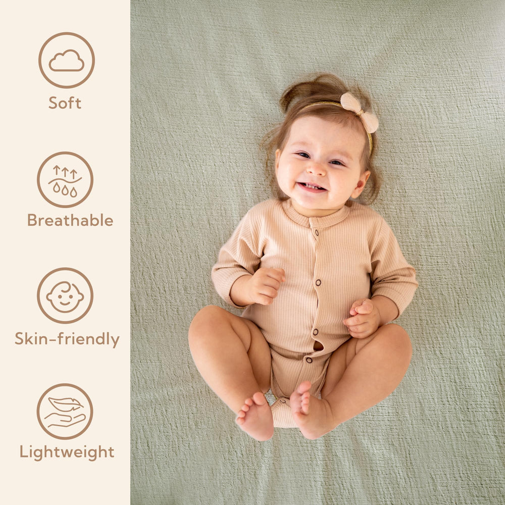 SOULFUL muslin crib sheets texture close-up highlighting gentle weave and breathability