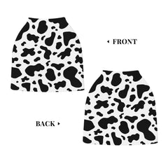Sozzjile cow print car seat canopy shields baby from sun and wind.