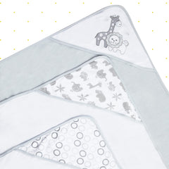 Close-up of Spasilk gray lion embroidery on towel edge.