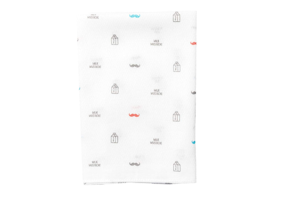 Spilt Milk washcloth close-up highlights durable cotton fibers.