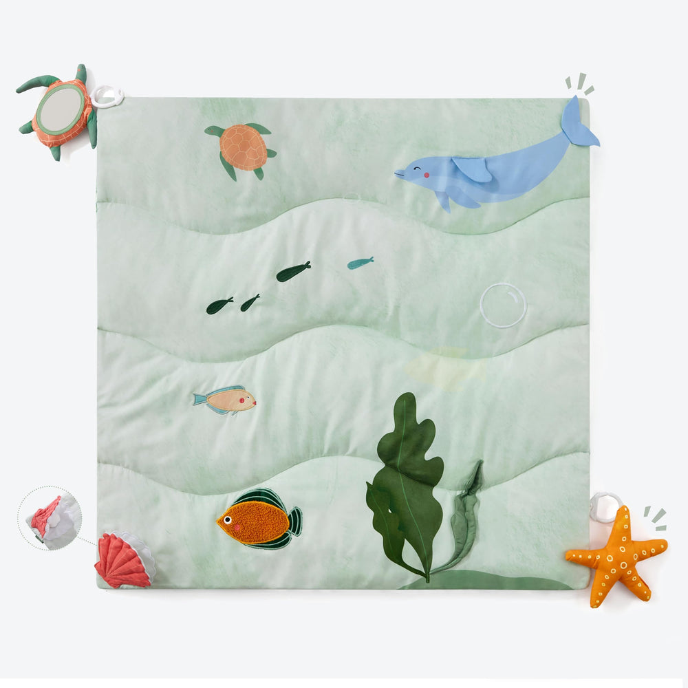 Spirich 9-in-1 tummy time mat closeup highlights the soft surface for gentle play.