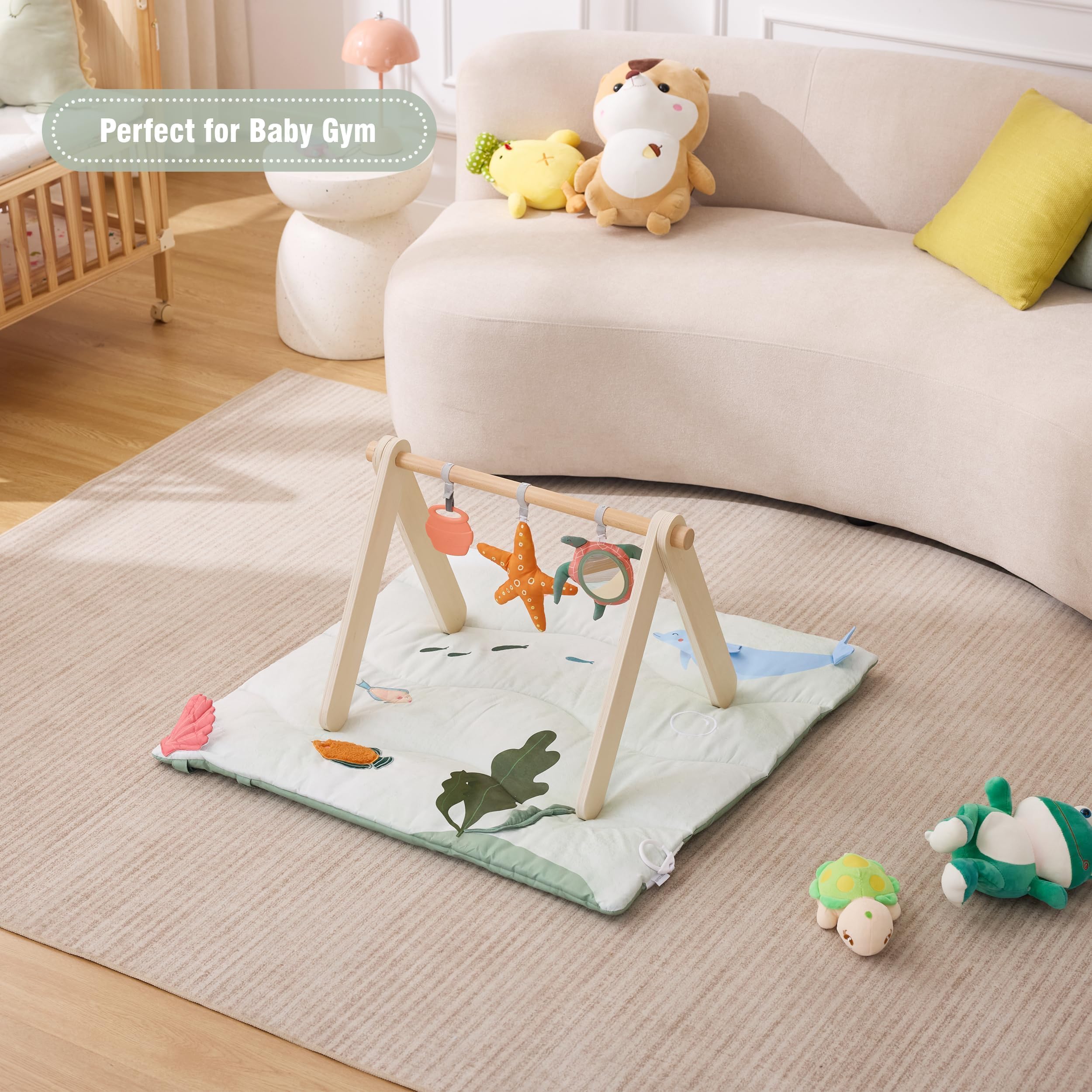 Spirich fish texture variety offers multi-sensory exploration during tummy time.