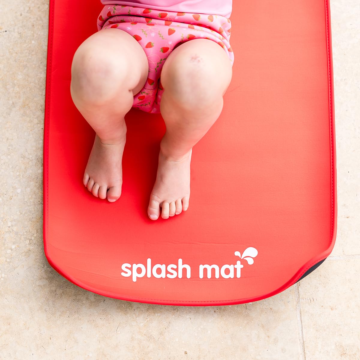 Splash About mat Red next to wipes for fast cleanup