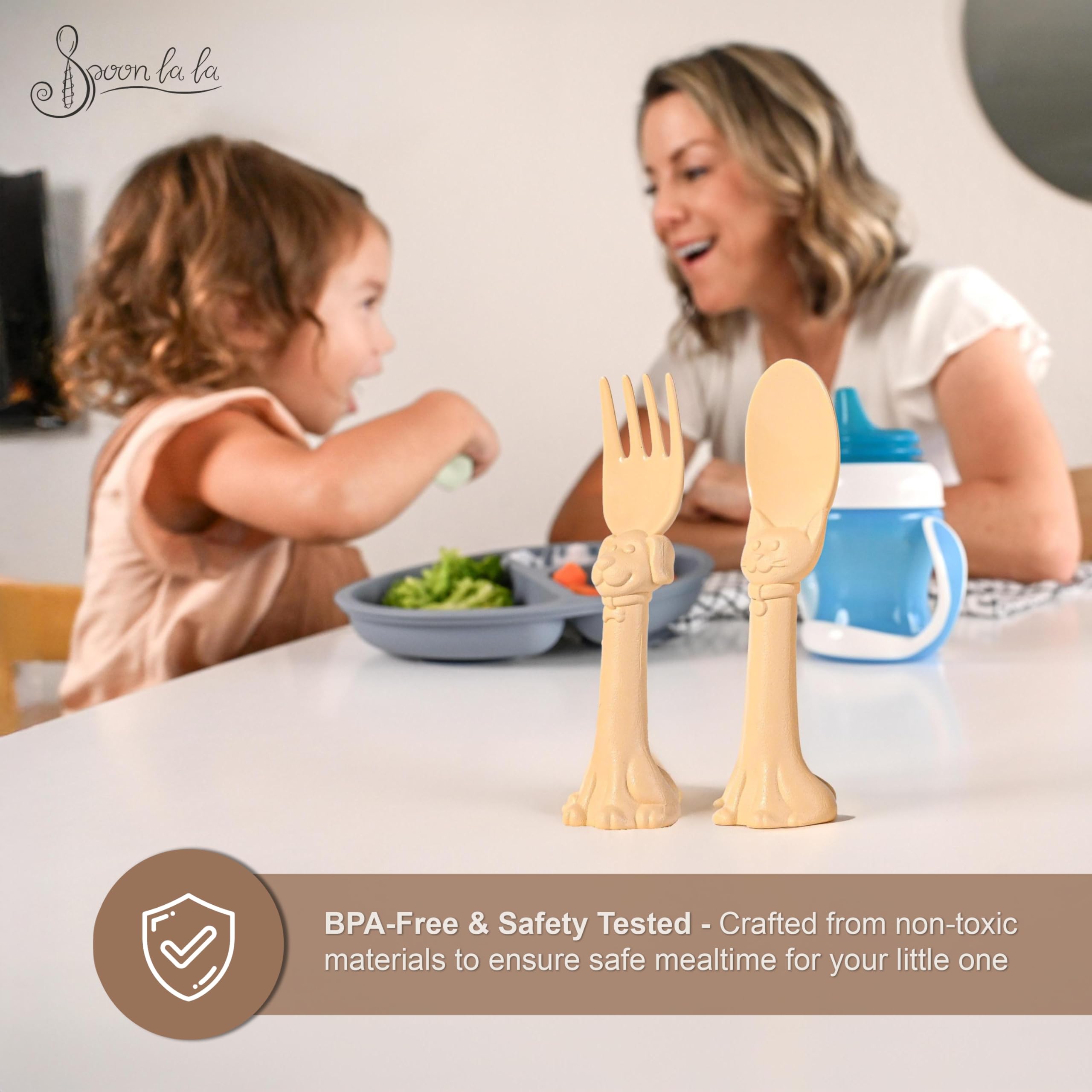 Spoon la la 3D ergonomic handles improve comfort during toddler meals.