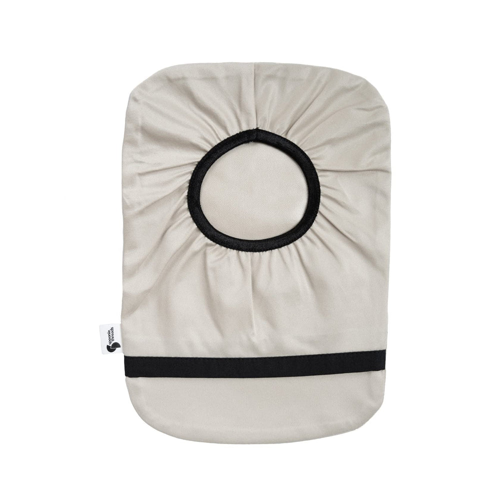 Spoonie Threads beige elastic ostomy cover with tight-fit design for secure pouch attachment.