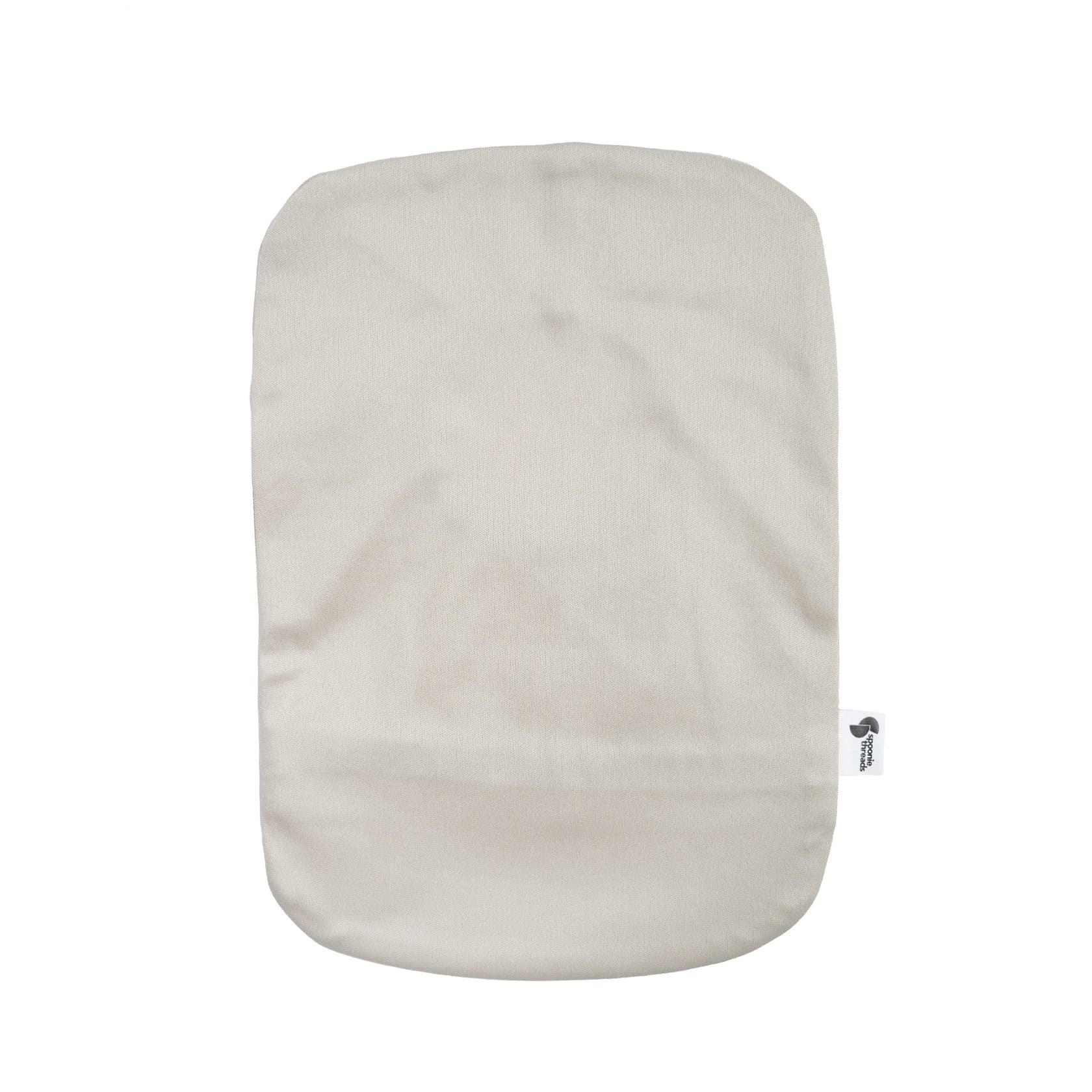 Spoonie Threads beige ostomy cover highlights lightweight, flexible wear for daily activities.