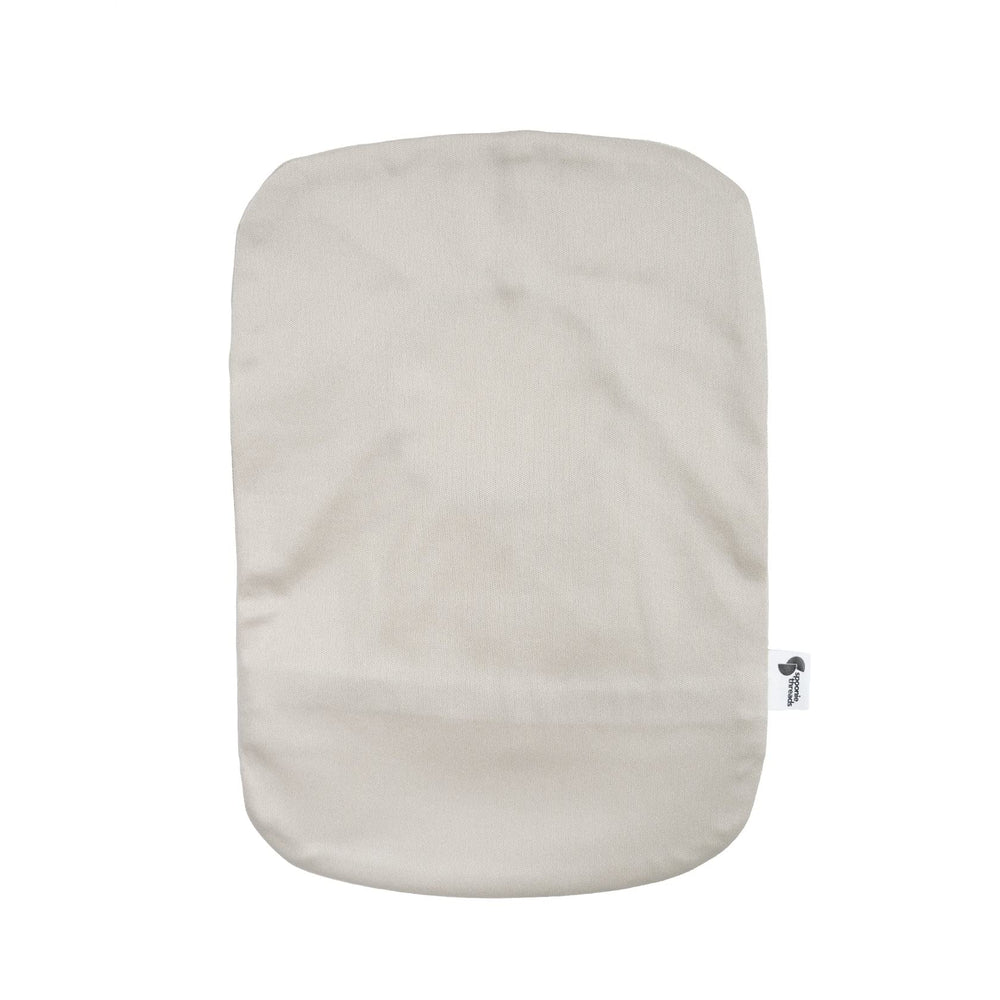 Spoonie Threads beige ostomy cover highlights lightweight, flexible wear for daily activities.