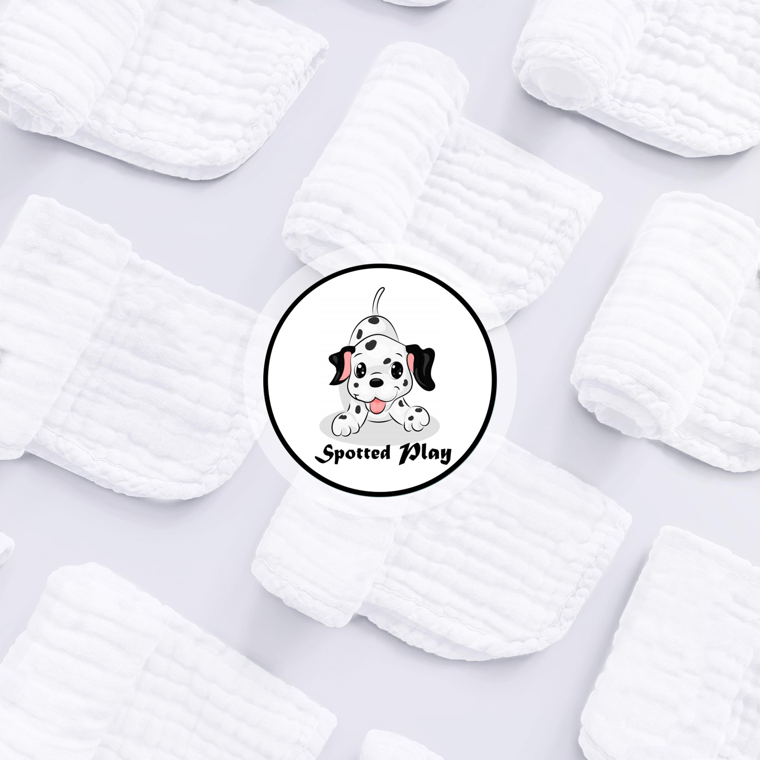 Close-up of Spotted Play muslin fabric, breathable and gentle on baby's skin.