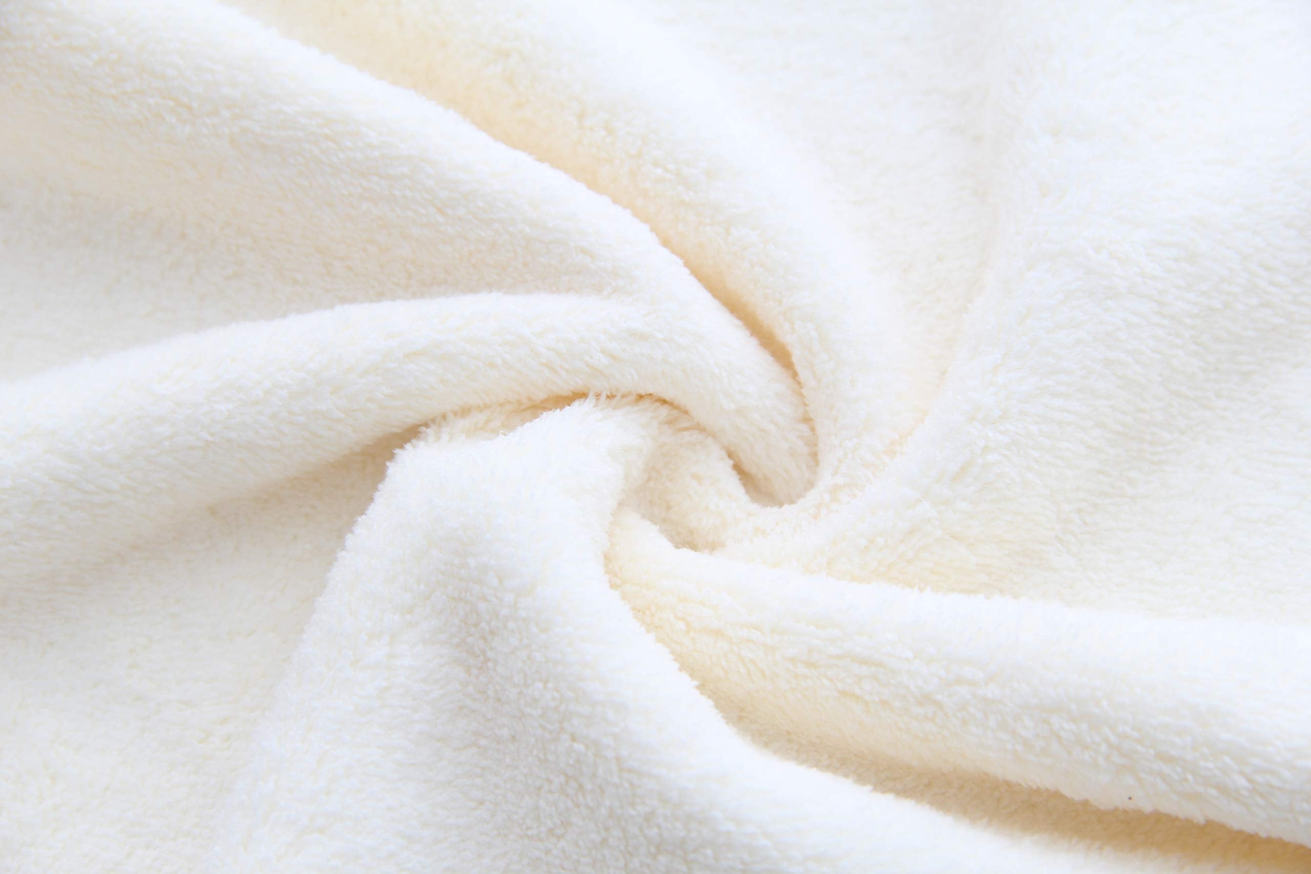 Spotted Play nursery setup with white-gray towels and microfiber washcloths