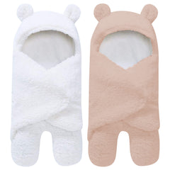 Spotted Play sherpa swaddle two-pack in brown and white, plush warmth for naps