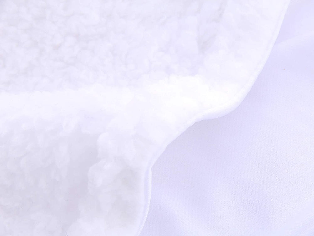 Spotted Play sherpa swaddle used in a stroller outing
