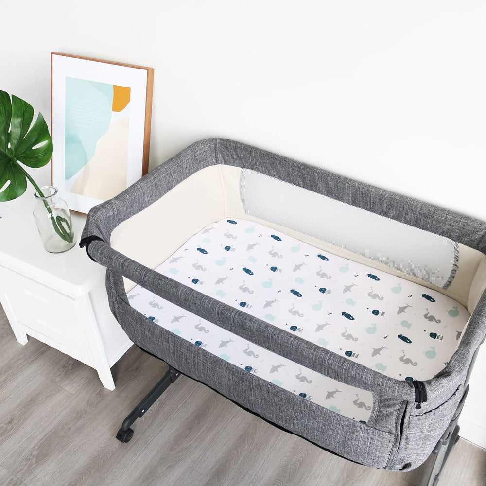 SPRINGSPIRIT bassinet sheet displays cute prints ideal for nursery themes and easy care.