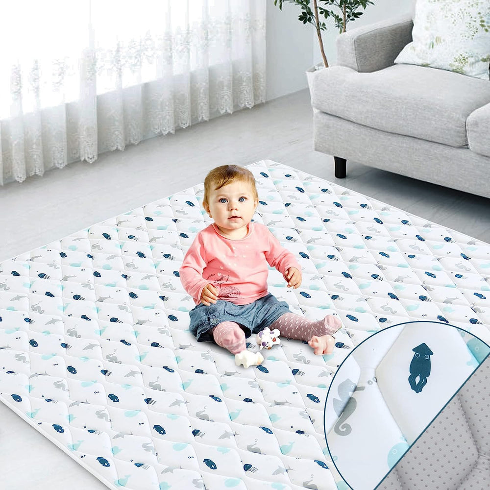 SPRINGSPIRIT premium foam baby play mat with whale design provides cushioned surface for play and exploration.