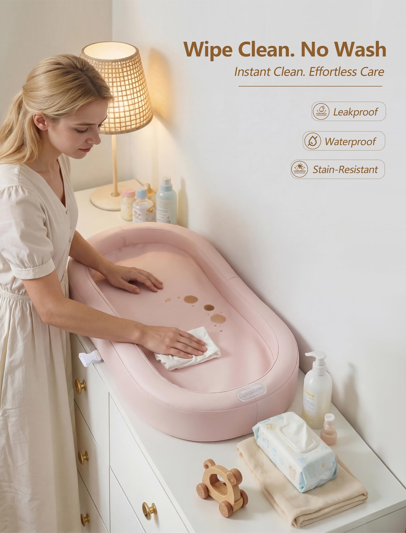 Sprouterie changing pad dresser-fit layout shows wide surface for babies