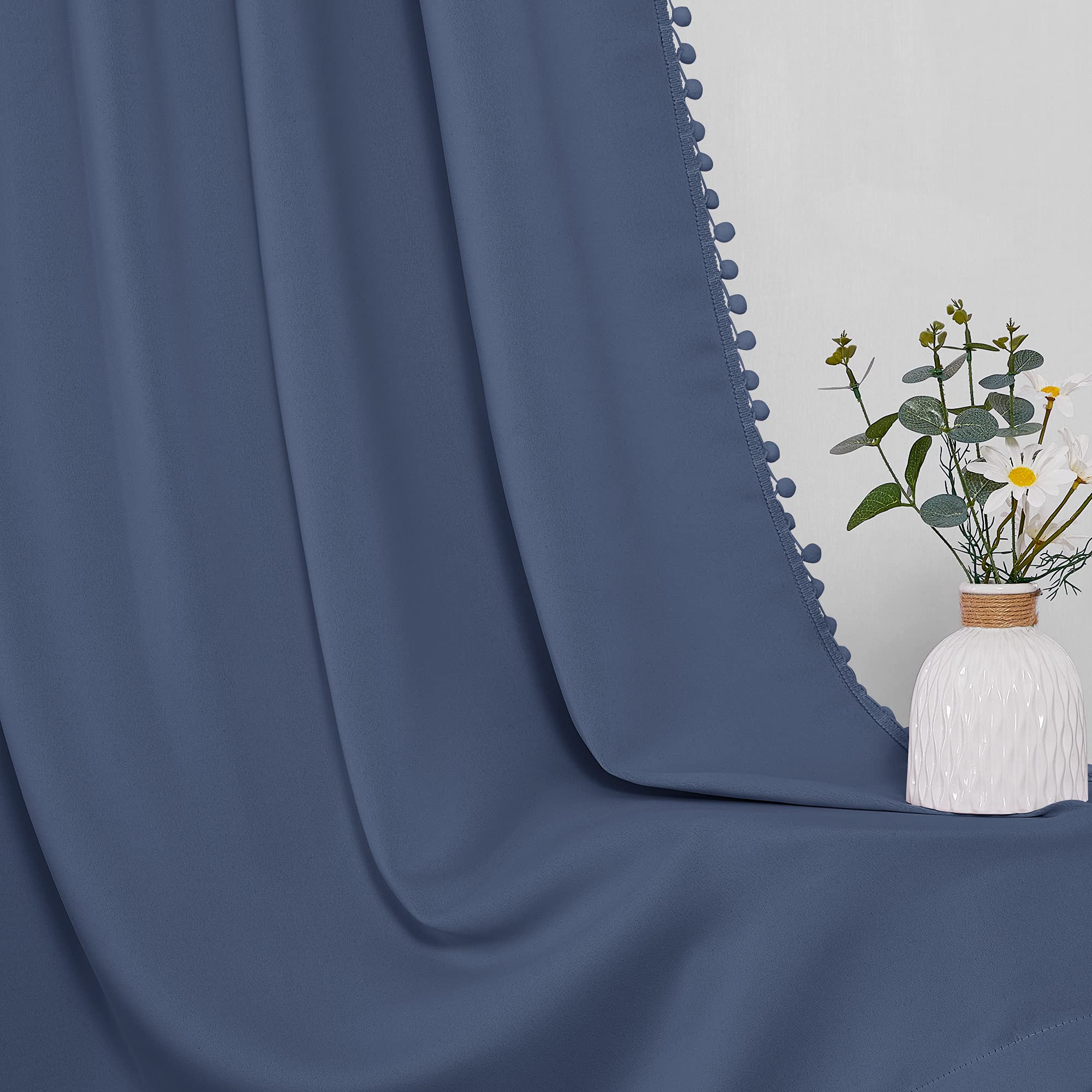 StangH dark room ambience with stone blue curtains.