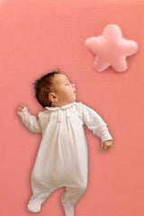 Stellar Kiddos crib sheet color options shown in orange and gray for stylish nurseries.