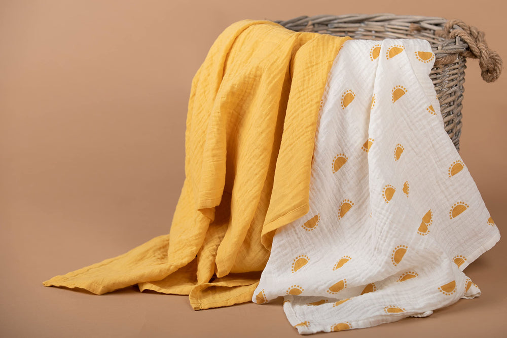 Sticky Toffee Muslin Swaddle edge hem detail for durability.