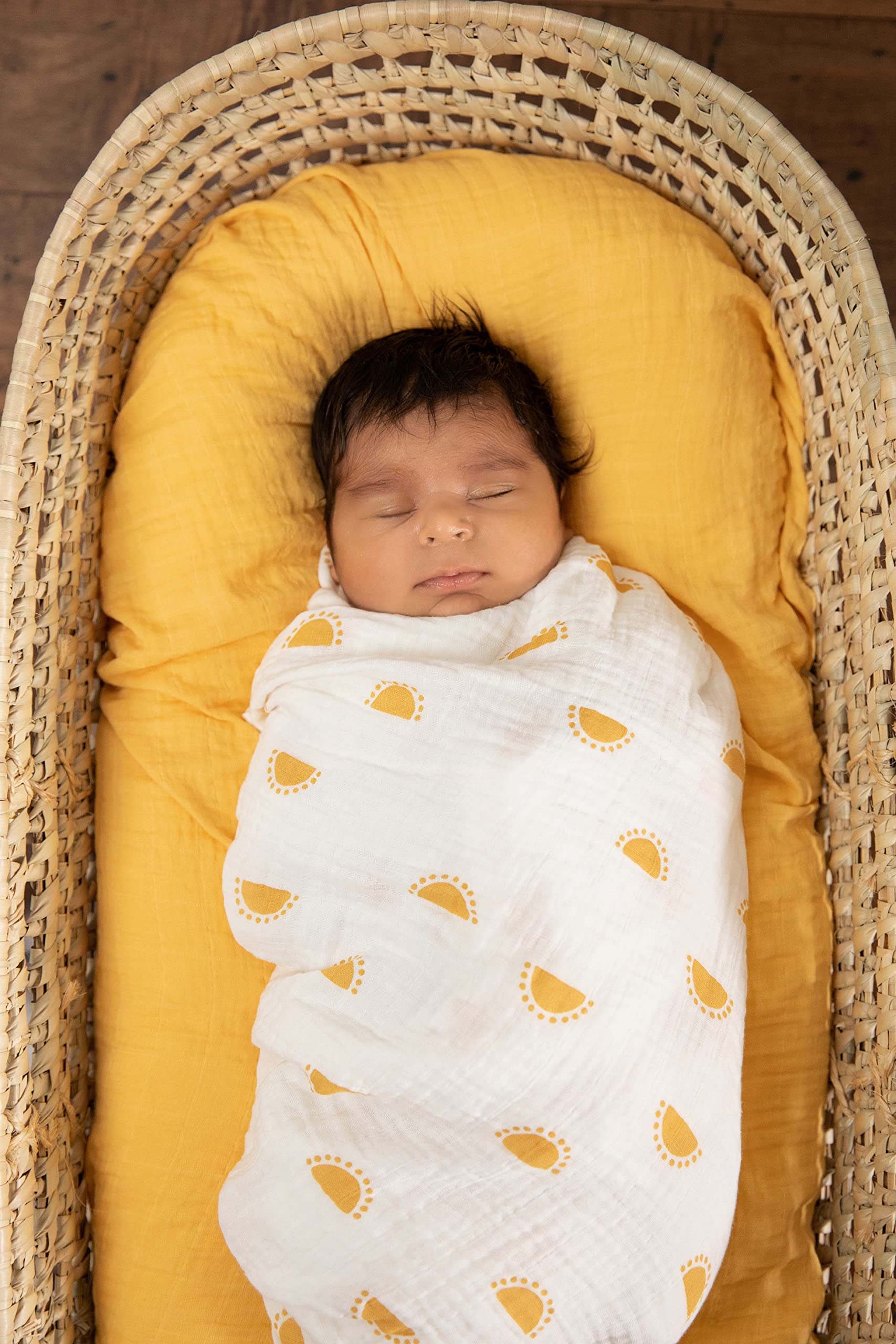 Sticky Toffee Muslin Swaddle Blanket, soft weave close view for newborn comfort.