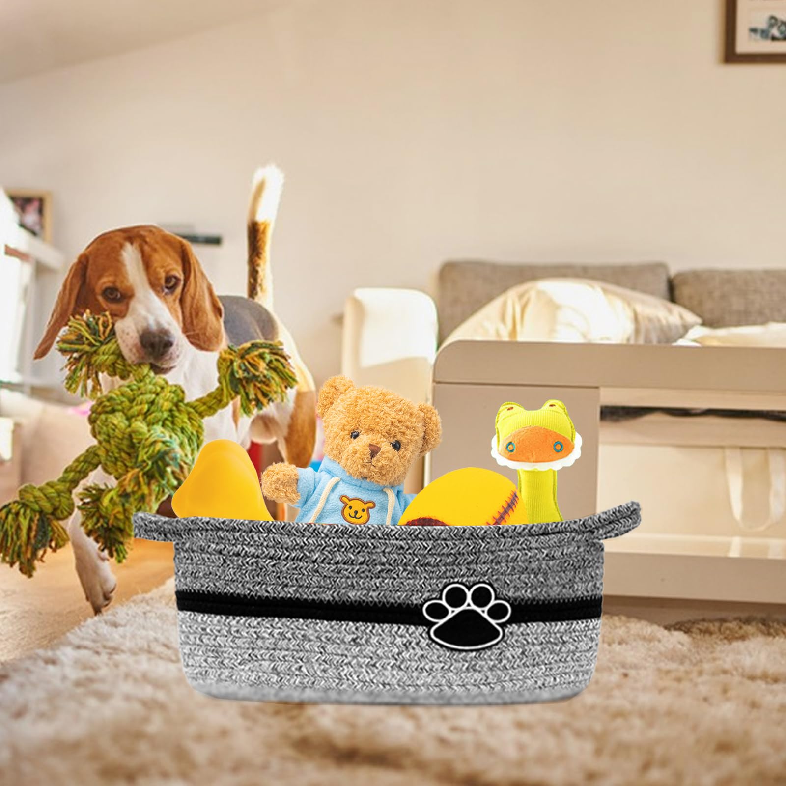 STOBS K gray and black nursery basket keeps toys tidy.
