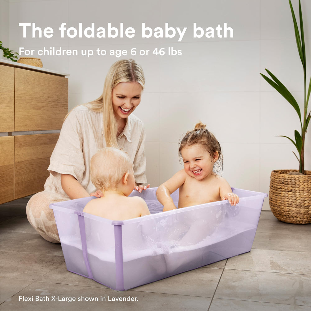 Stokke Flexi Bath X-Large Mickey Celebration folded for compact storage.