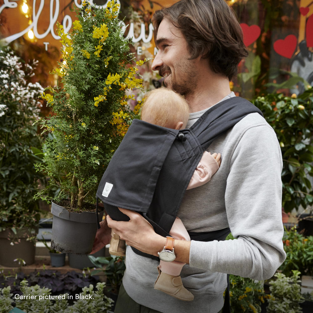 Stokke Limas carrier compact design fits bags for everyday outings.