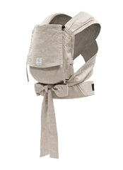 Stokke Limas carrier floral beige front view highlights ergonomic support for newborns.