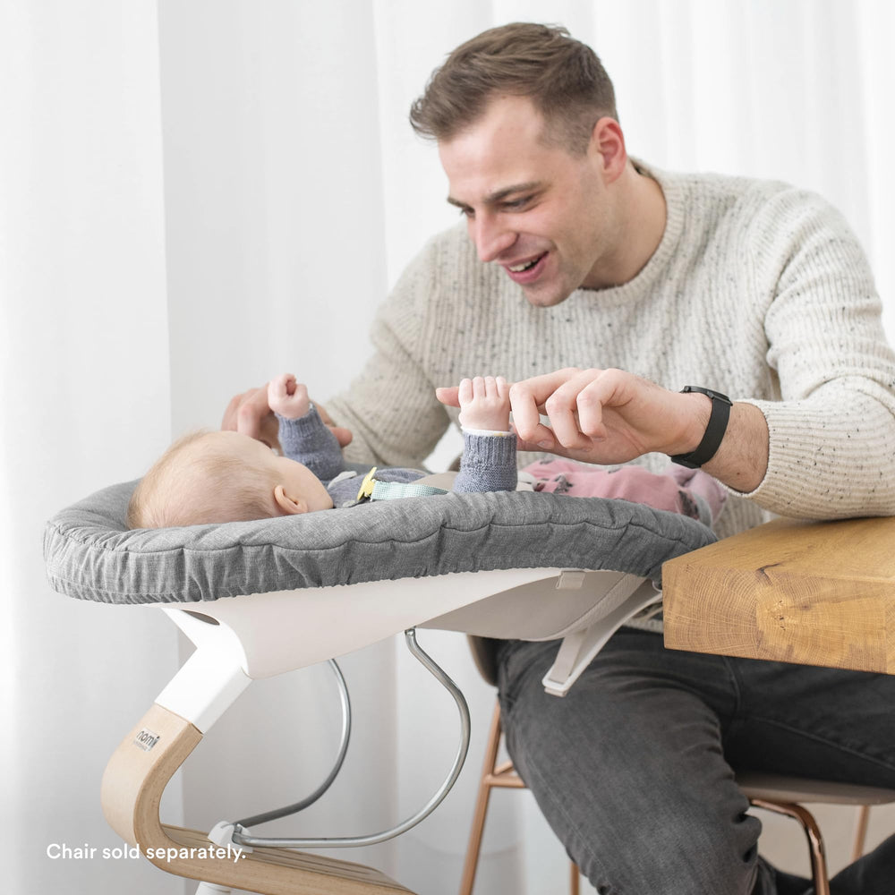 Stokke Nomi Newborn Set fits all Nomi chairs for versatile use.