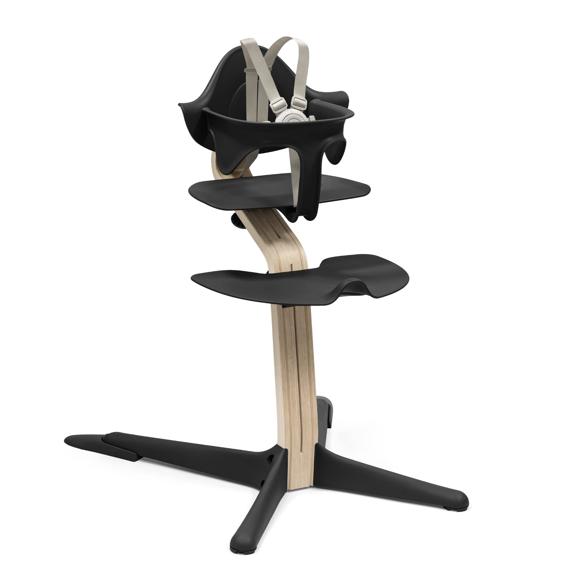 Stokke Nomi high chair at table for family meals.