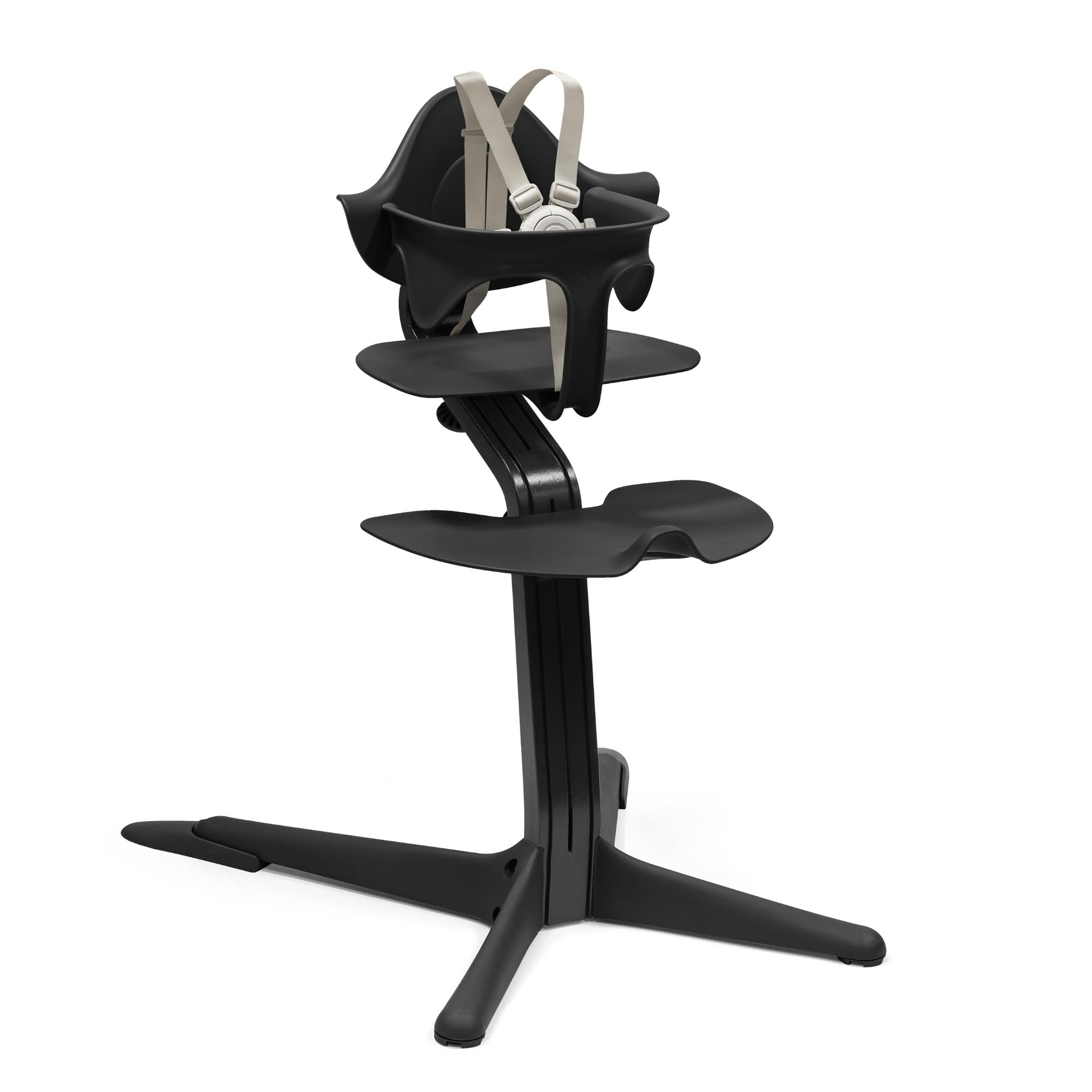 Stokke Nomi high chair at table for family dining and interaction