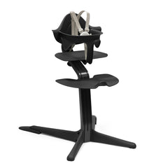 Stokke Nomi high chair at table for family dining and interaction