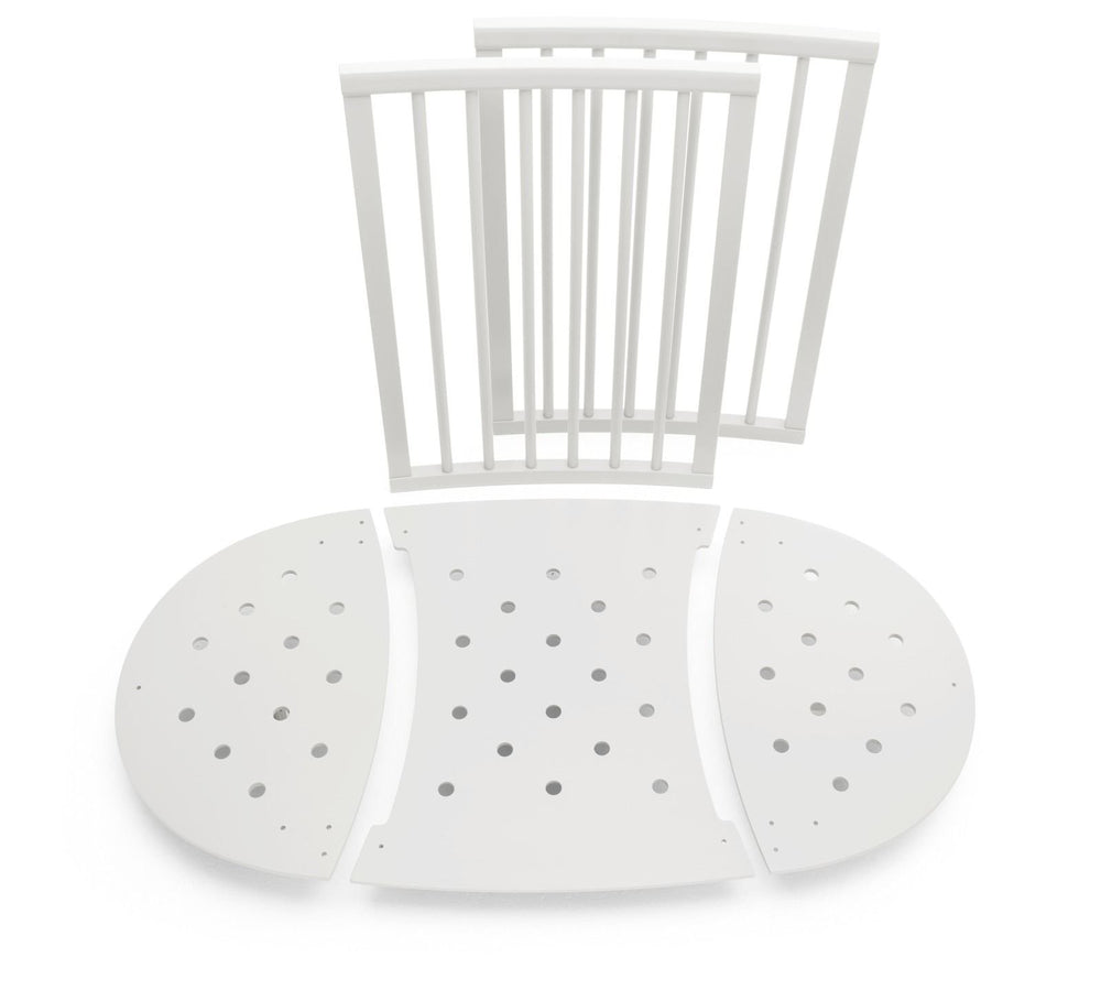 Stokke Sleepi Bed Extension V2 assembly demonstrates easy crib-to-bed transformation.