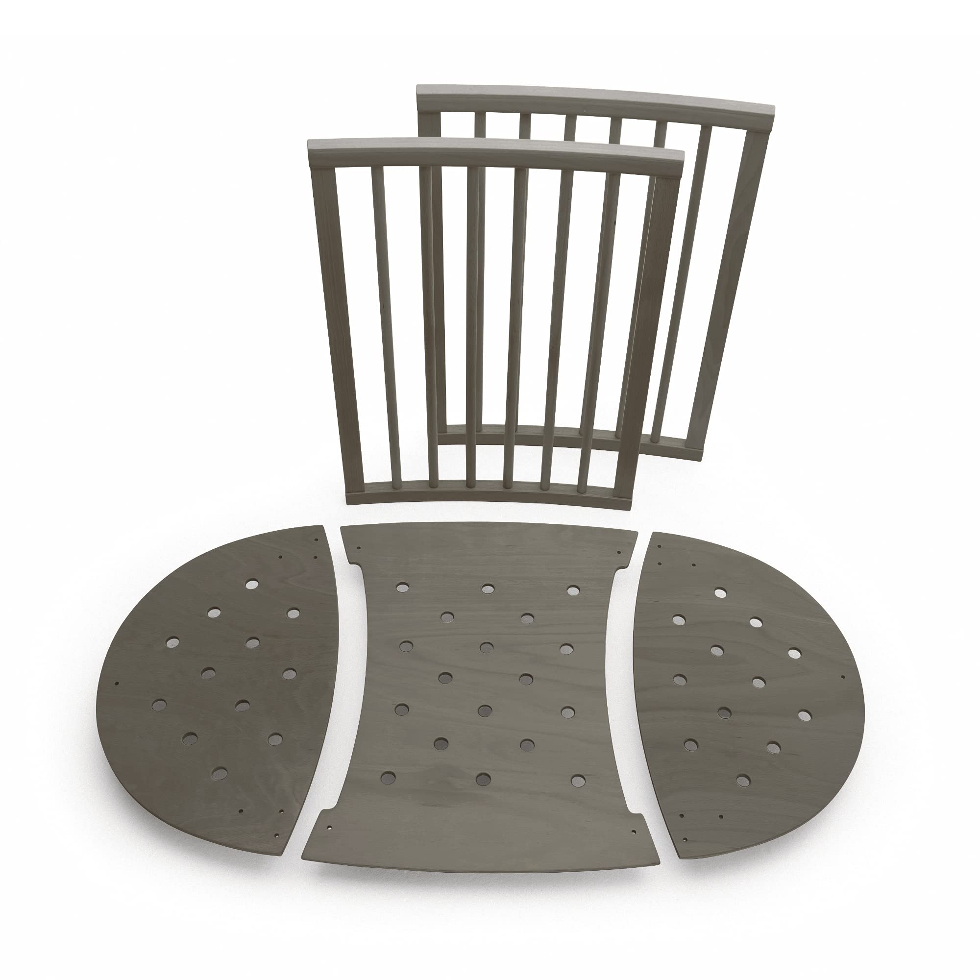 Stokke Sleepi Bed Extension V2 in hazy grey packaging shows included parts for quick setup.
