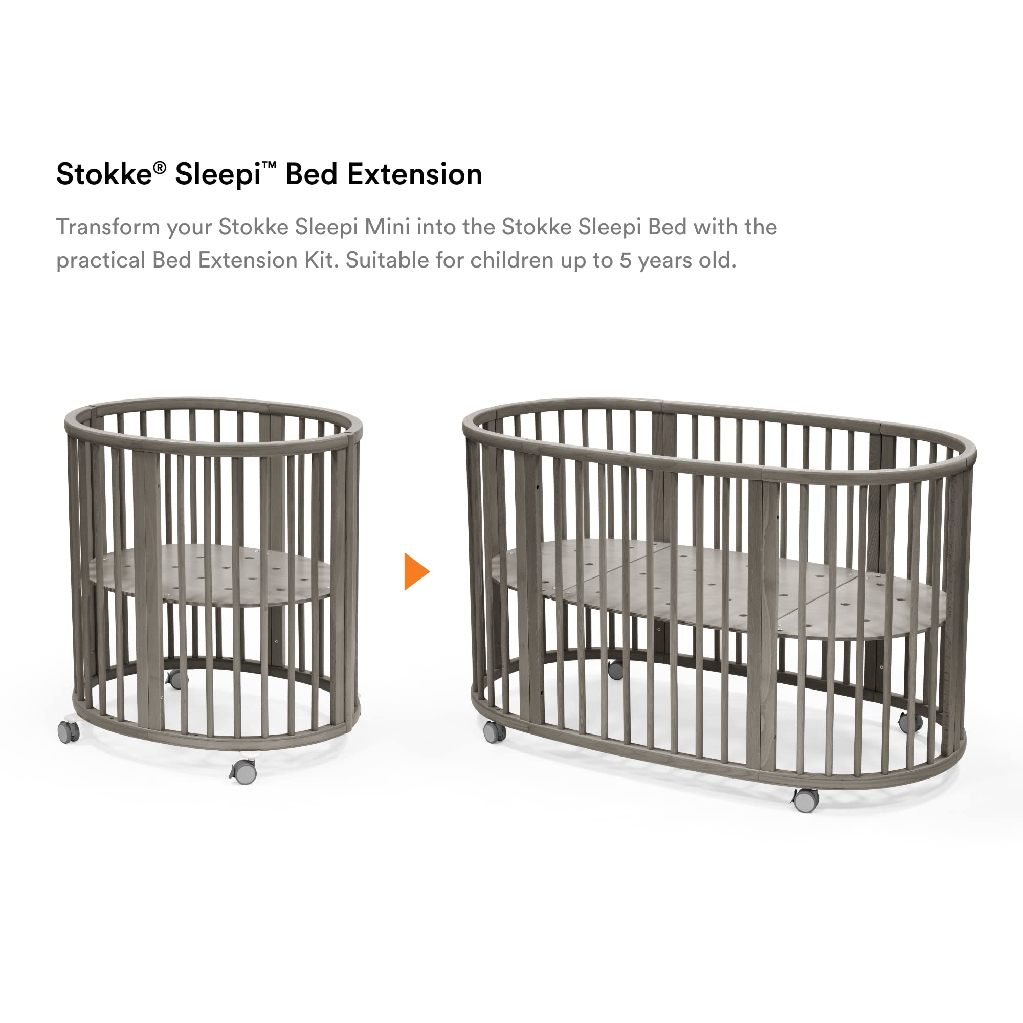 Stokke Sleepi Bed Extension V3 hazy grey in use, converting a mini crib to a full bed.