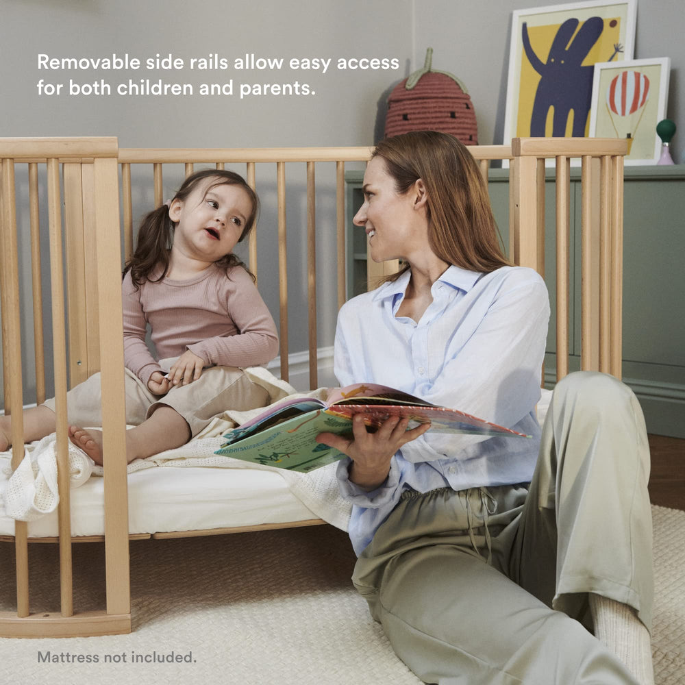 Stokke Sleepi Bed V3 swivel wheels simplify moving the bed between rooms.