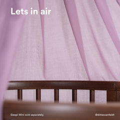 Stokke Sleepi Canopy V3 Lavender pleated detailing adds Nordic-inspired softness.