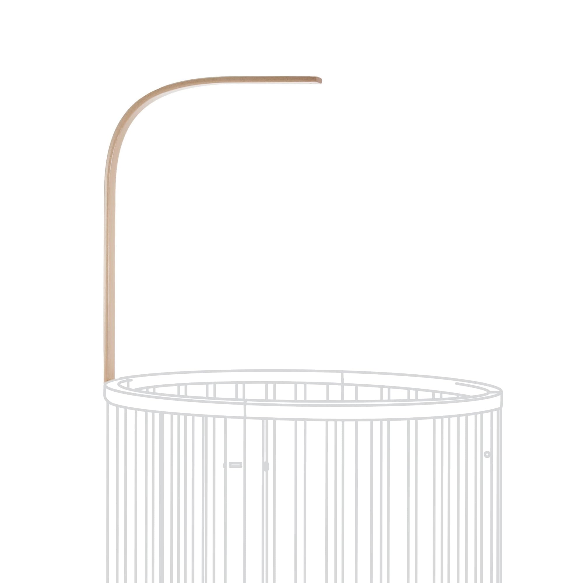 Stokke Sleepi Drape Rod Natural mounted on crib for soft nursery drapery.