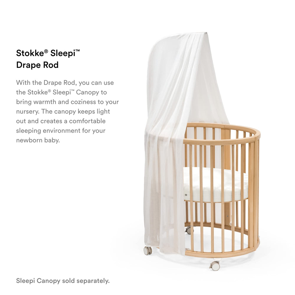 Stokke Sleepi Drape Rod V3 end-cap supports mobiles for baby entertainment.