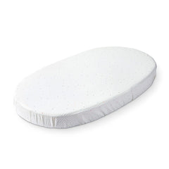 Stokke Sleepi fitted sheet rainbow dot close-up showing soft organic cotton for gentle sleep.