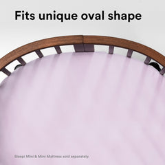 Stokke Sleepi Mini fitted sheet V3 compatibility label demonstrates secure fit.
