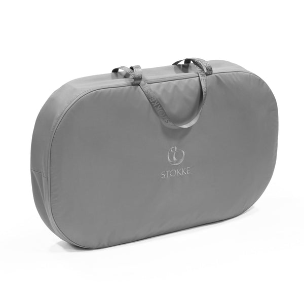 Stokke Snoozi Bag in dark grey protects the Snoozi bassinet during travel.