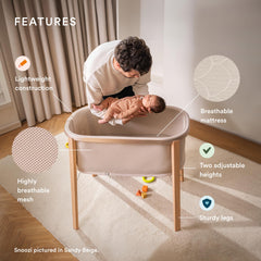 Stokke Snoozi Bassinet Graphite Grey legs and frame for easy movement.