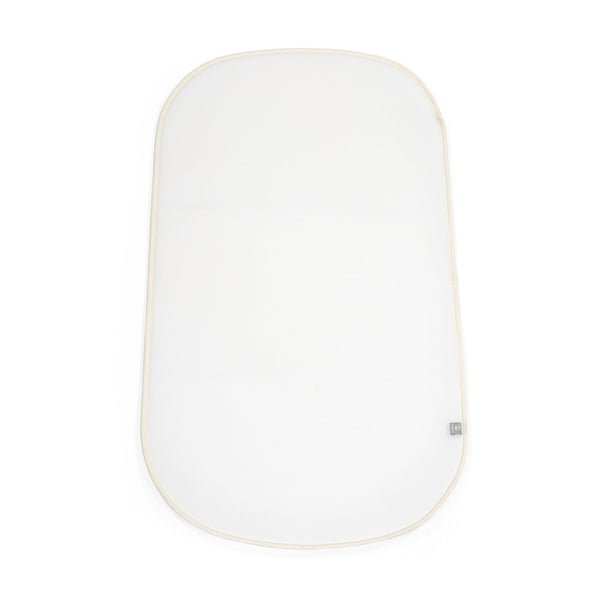Stokke Snoozi Protection Sheet mattress cover keeps the bassinet clean and fresh