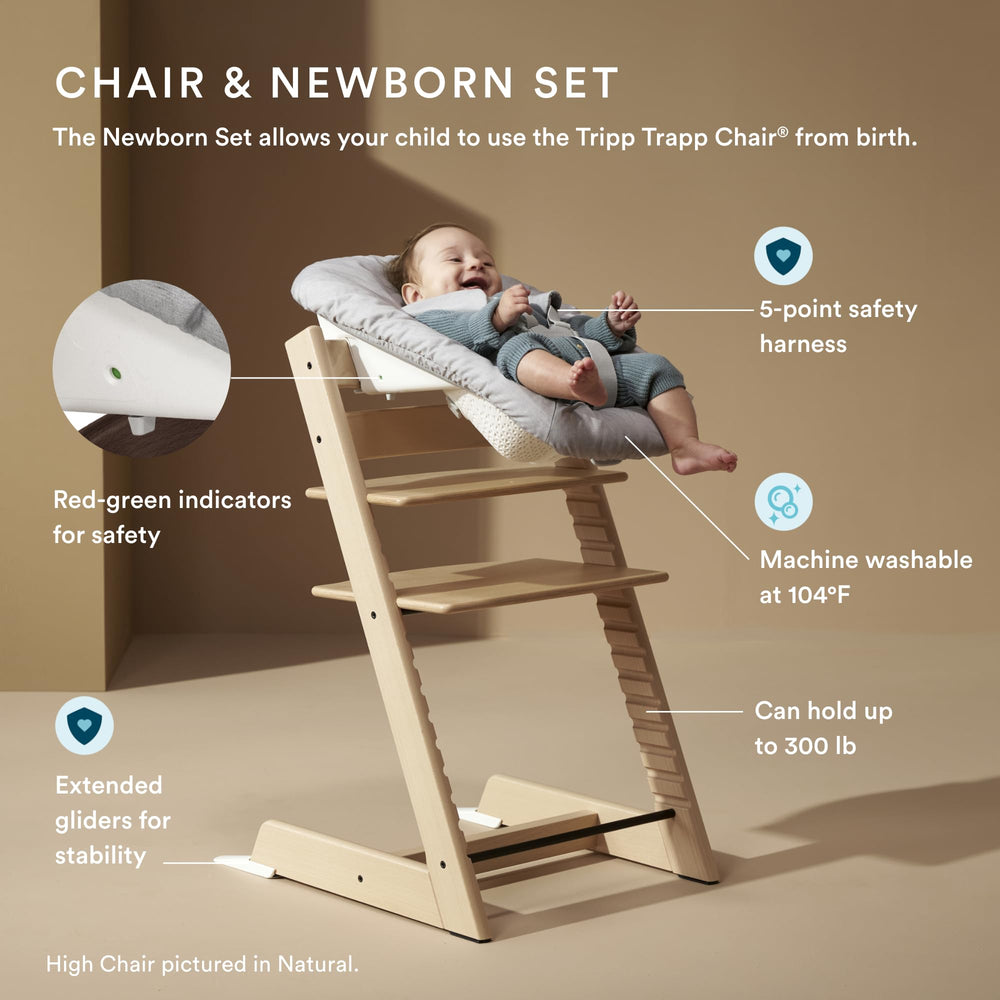 Stokke Tripp Trapp Baby Set attached for secure high chair use.