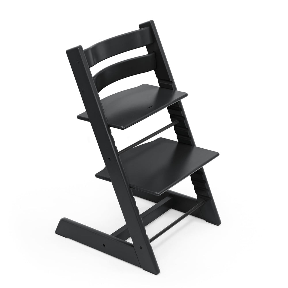 Stokke Tripp Trapp chair black with adjustable seat for growing kids.