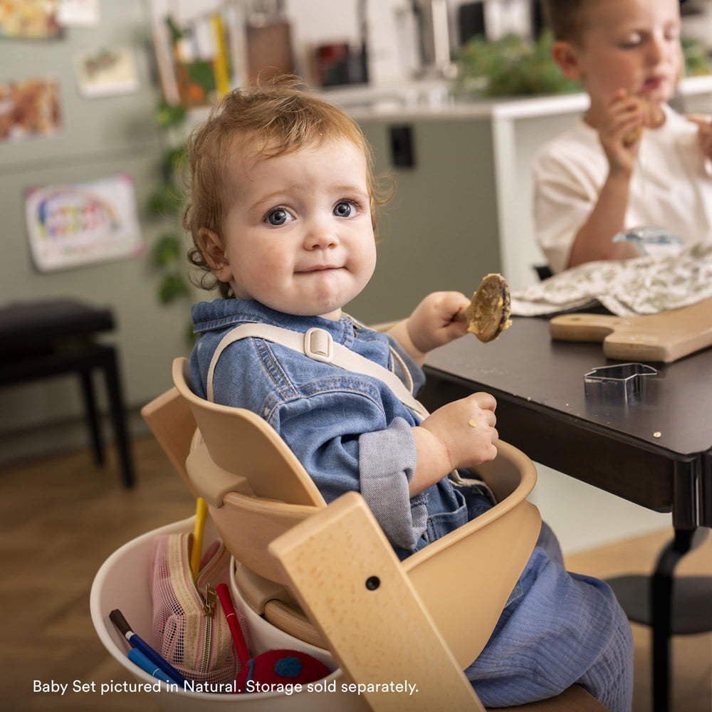 Stokke Tripp Trapp chair ergonomic angle adjustment supports growing child.