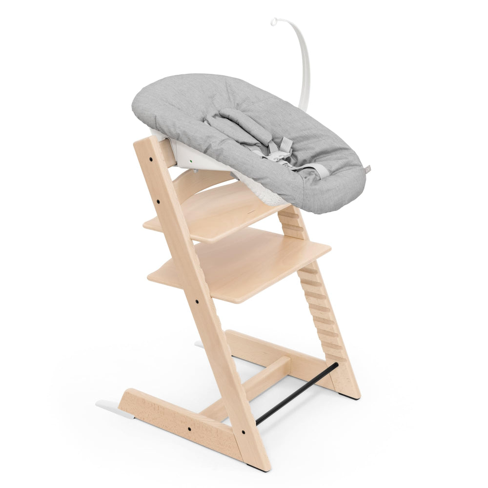 Stokke Tripp Trapp chair natural finish with adjustable seat for growing kids.