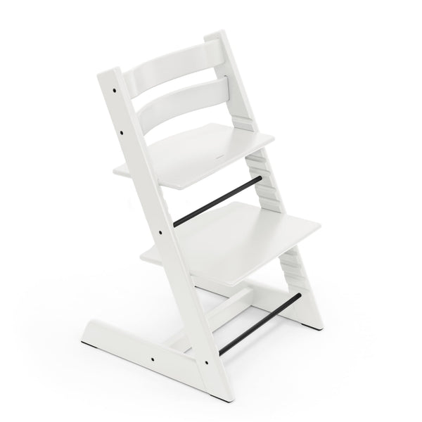 Stokke Tripp Trapp chair white front view showing compact design for table seating.