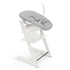 Stokke Tripp Trapp chair white, front view, compact at-table seating for families.