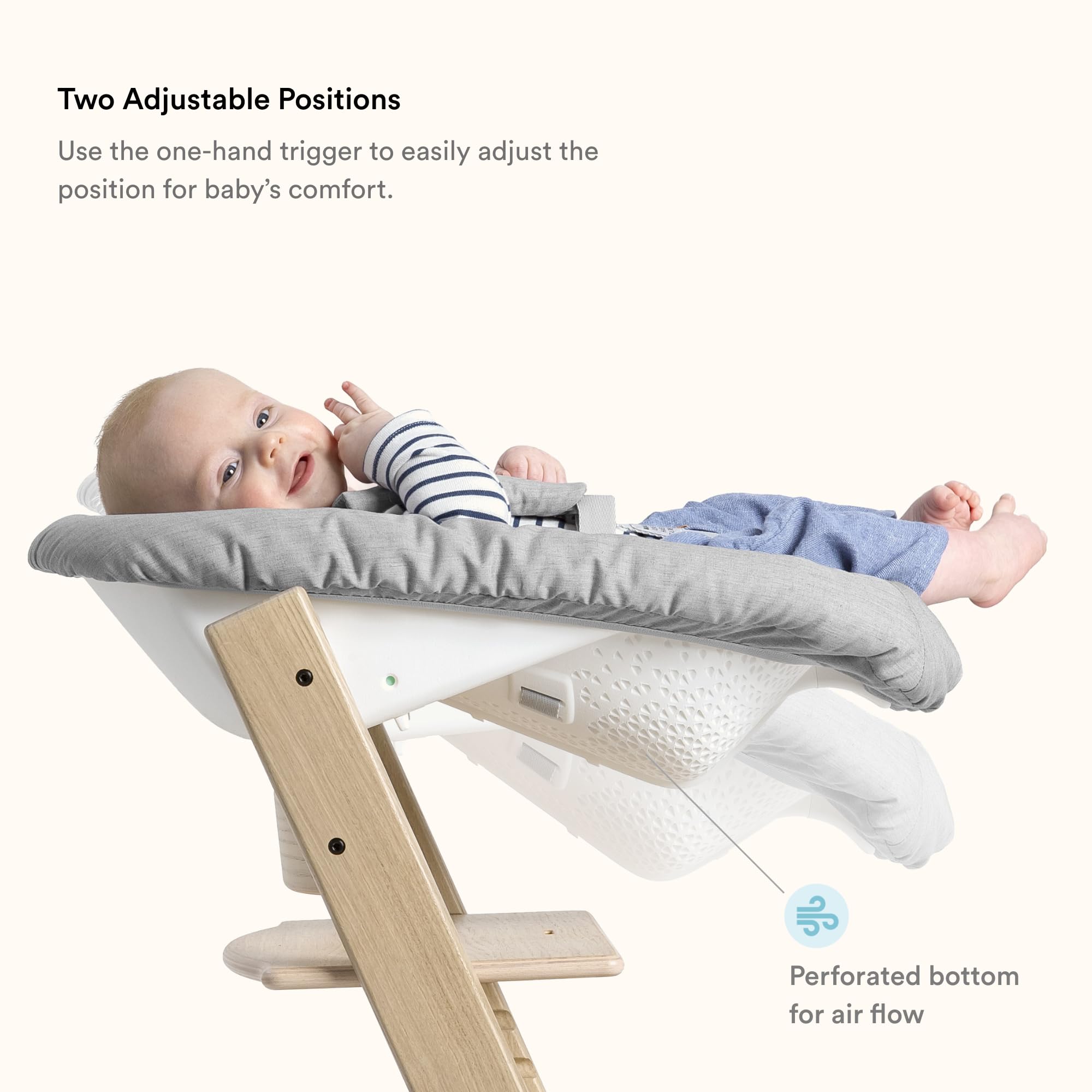 Stokke Tripp Trapp newborn set positioning—cozy, nest-like seating from birth.